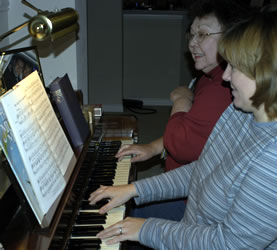 Arrion and Mom at piano