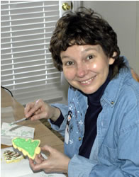 Annette decorating cookies