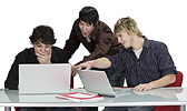 Three students at computers